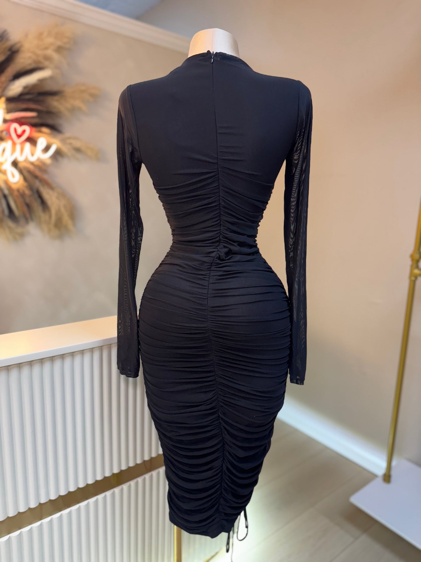 Asymmetrical black midi dress