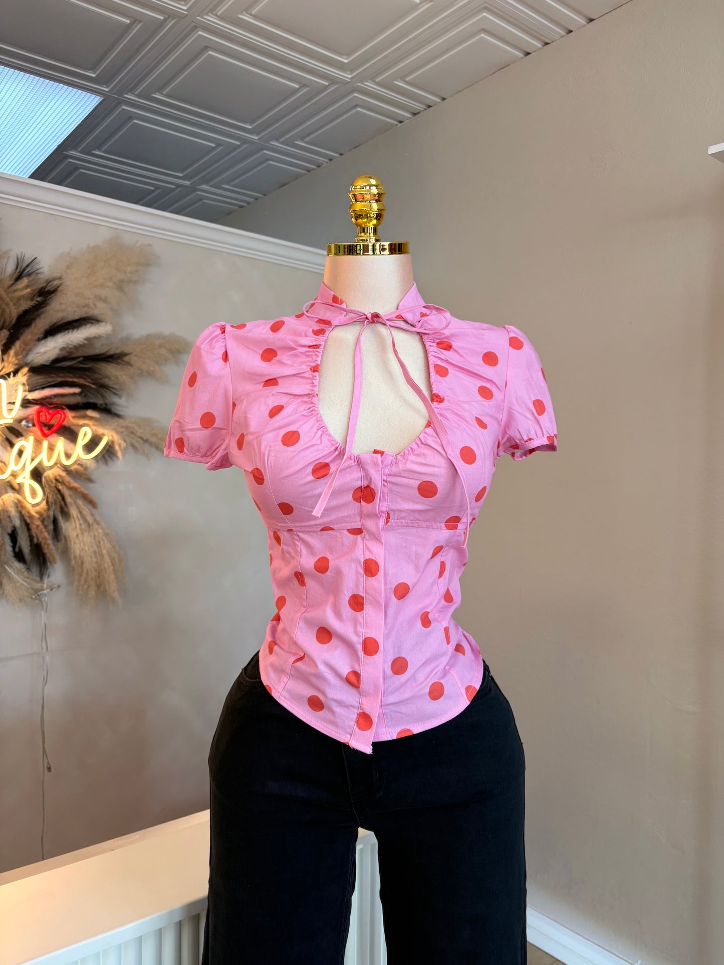 Pink polka dot blouse