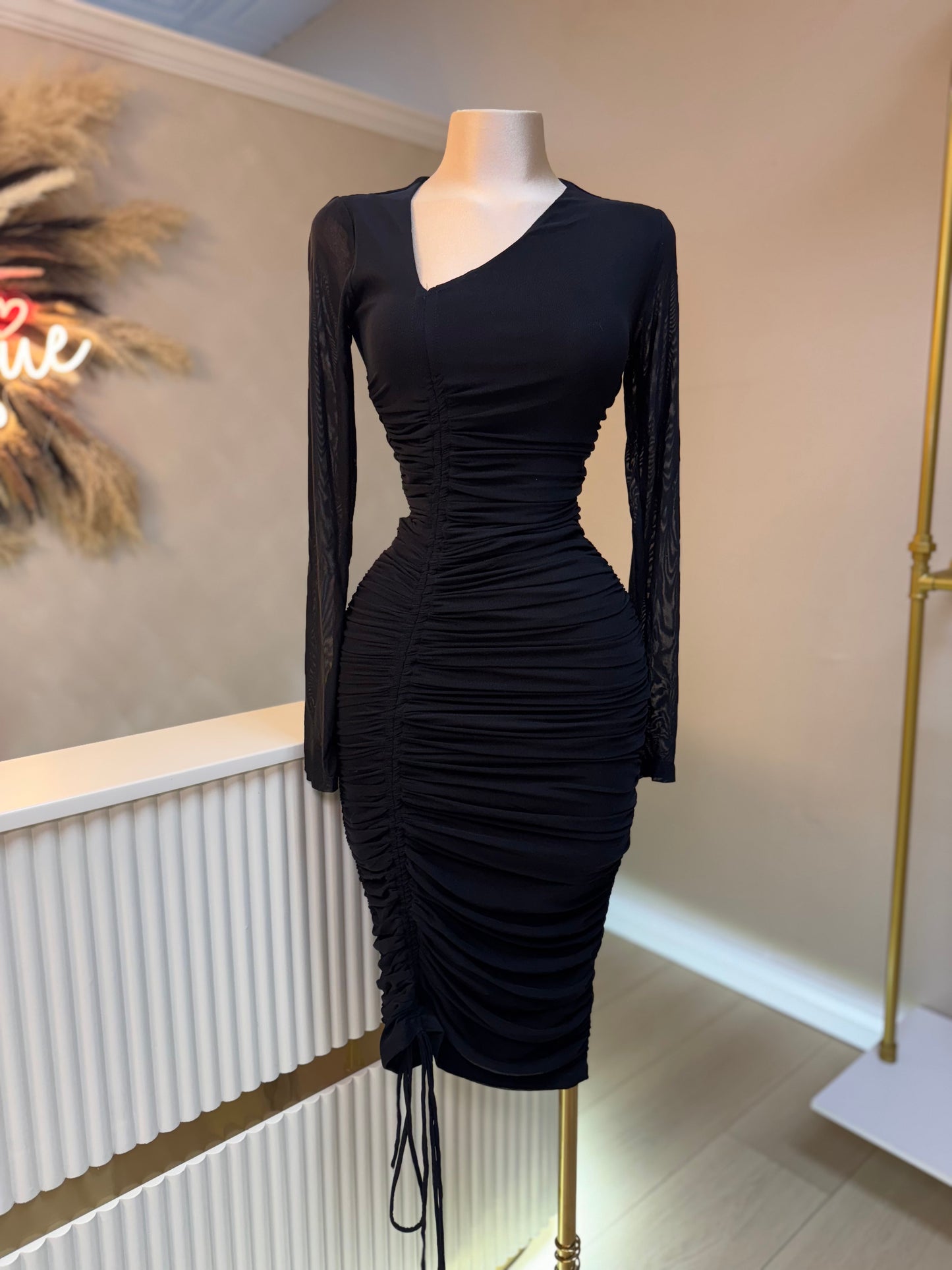 Asymmetrical black midi dress