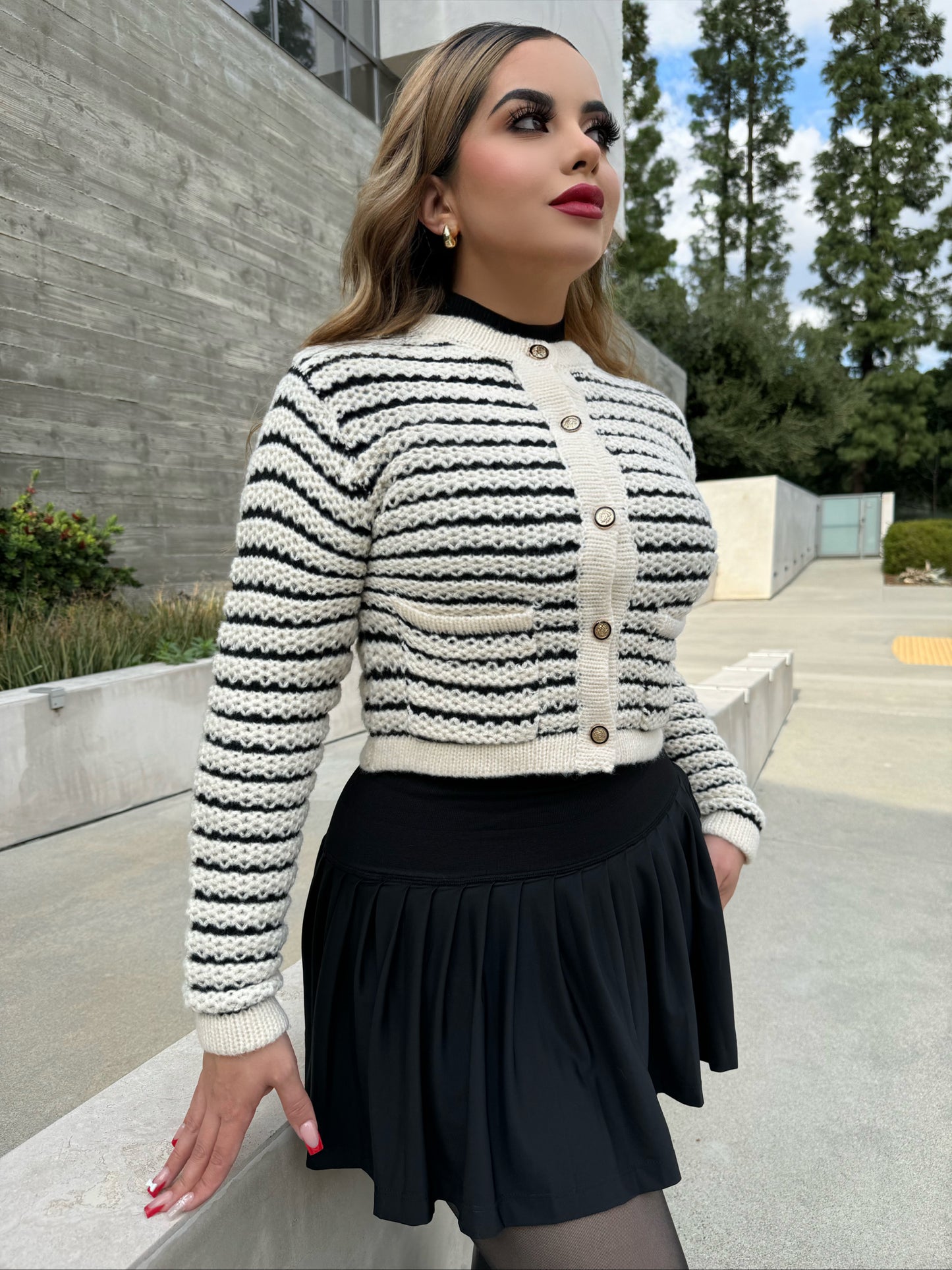 Black and white knitted button up sweater