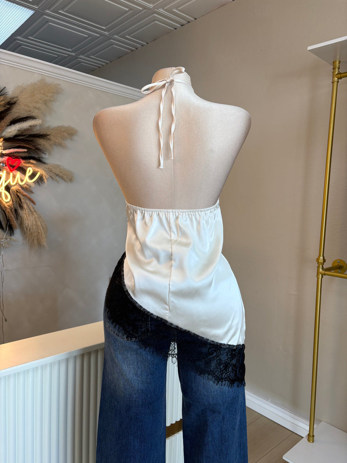 Black and white asymmetrical halter top